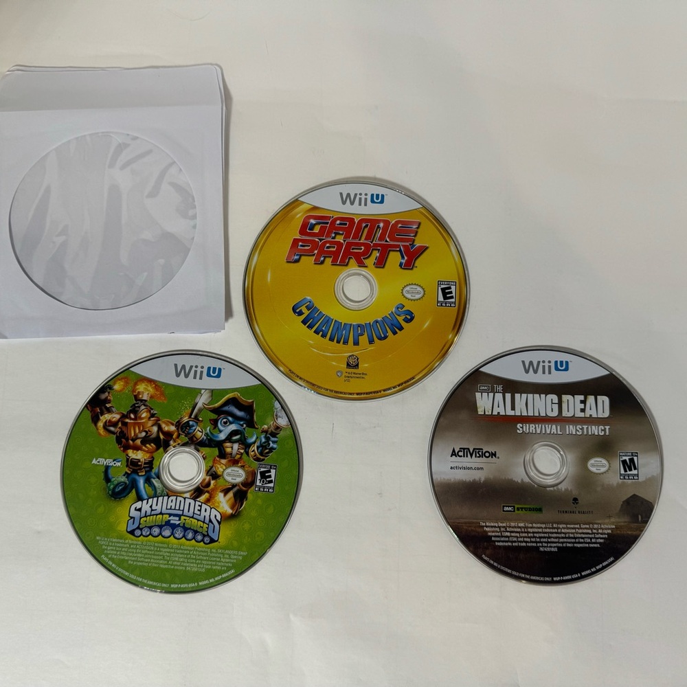 WiiU 3 Game Disc Set - Game Party Champions, Skylanders Swap Force, Walking Dead